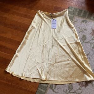Butter yellow Zara midi skirt. New with tags (M).